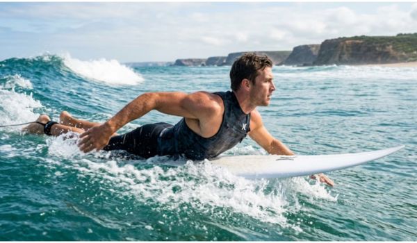 Is Surfing a Good Workout? Calories & Muscle Benefits